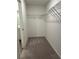 Large walk-in closet with a metal shelving unit for optimal storage space at 1001 Limburg Dr, Hampton, GA 30228