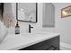 Bright bathroom featuring a modern vanity with black hardware at 208 Wade Creek Rd, Alpharetta, GA 30009