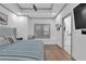 A serene bedroom with a window seat, built-in storage, and a comfortable, inviting bed at 208 Wade Creek Rd, Alpharetta, GA 30009
