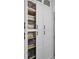 A linen closet with 4 doors and ample storage space at 208 Wade Creek Rd, Alpharetta, GA 30009