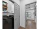A well-organized laundry area with a modern washer and dryer setup at 208 Wade Creek Rd, Alpharetta, GA 30009