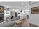 Inviting living space featuring an open kitchen, a large island, and hardwood floors at 208 Wade Creek Rd, Alpharetta, GA 30009