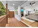 Inviting porch with access to an open-concept living room and adjacent fenced outdoor area at 208 Wade Creek Rd, Alpharetta, GA 30009