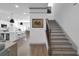 Open-concept layout with staircase leading upstairs at 208 Wade Creek Rd, Alpharetta, GA 30009