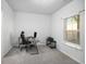 Carpeted office space with large window, perfect for working from home at 2517 Hedgeway Cir, Kennesaw, GA 30144