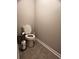 Small bathroom with toilet, tile floor, and neutral paint at 2778 Wild Laurel Ct, Norcross, GA 30071
