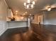 Open concept living and dining area with hardwood floors, recessed lighting, and neutral wall paint at 2778 Wild Laurel Ct, Norcross, GA 30071