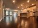 Open concept living space with hardwood floors and an eat-in kitchen featuring stainless steel appliances at 2778 Wild Laurel Ct, Norcross, GA 30071