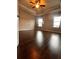 Large bedroom with hardwood floors, a ceiling fan and lots of light at 2778 Wild Laurel Ct, Norcross, GA 30071