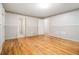 Another view of a large bedroom with hardwood floors at 5247 Yeager Rd, Douglasville, GA 30135
