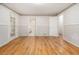 Spacious bedroom with hardwood floors and access to other rooms in the home at 5247 Yeager Rd, Douglasville, GA 30135