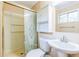 Bathroom featuring a toilet, sink, mirrored cabinet, and shower with sliding doors at 364 Stafford Sw St, Marietta, GA 30064