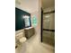 Bathroom with a modern vanity, mirror, and frameless glass shower at 364 Stafford Sw St, Marietta, GA 30064