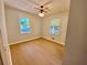 Bedroom featuring neutral walls, hardwood floors, and two windows that provide ample light at 364 Stafford Sw St, Marietta, GA 30064