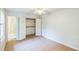 This bedroom features an en-suite bathroom and ample closet space, with access to other areas of the home at 364 Stafford Sw St, Marietta, GA 30064