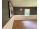 Dining area featuring fresh paint, a window with natural light and a modern chandelier at 364 Stafford Sw St, Marietta, GA 30064