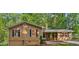 Charming single story home features a quaint front porch and well-maintained landscaping at 364 Stafford Sw St, Marietta, GA 30064