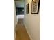 Hallway with modern artworks that leads to the dining area at 364 Stafford Sw St, Marietta, GA 30064