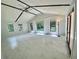 Large living room with an open beam ceiling, and an abundance of windows at 364 Stafford Sw St, Marietta, GA 30064