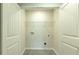 Laundry closet featuring ample space, modern connections, and a functional layout for easy organization at 2804 Georgia Aster Way Nw, Atlanta, GA 30318