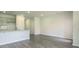 Open-concept living space with wood flooring and modern kitchen at 2804 Georgia Aster Way Nw, Atlanta, GA 30318
