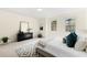 A spacious bedroom with plenty of natural light, a large rug, and a comfortable bed at 2808 Broughton Se Ln, Atlanta, GA 30339