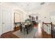 Charming dining area leads to an open kitchen and features rich hardwood flooring at 2808 Broughton Se Ln, Atlanta, GA 30339