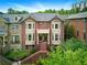 Beautiful brick townhome with lush landscaping and inviting entrance at 2808 Broughton Se Ln, Atlanta, GA 30339