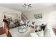 Inviting living room with hardwood floors, wainscoting and seamless flow to dining area at 2808 Broughton Se Ln, Atlanta, GA 30339