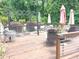 Spacious back deck surrounded by lush greenery, ideal for relaxation and gatherings at 710 Oxford Crest Ct, Lawrenceville, GA 30043