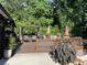 Inviting back deck perfect for outdoor entertaining, featuring ample seating and shade at 710 Oxford Crest Ct, Lawrenceville, GA 30043