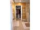 Bright bathroom featuring a large walk-in closet and tiled walk-in shower with a wooden ladder for hanging towels at 710 Oxford Crest Ct, Lawrenceville, GA 30043