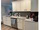 Updated kitchen with granite countertops, stainless steel appliances, and modern cabinetry at 710 Oxford Crest Ct, Lawrenceville, GA 30043