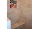 Close-up of a beautifully tiled walk-in shower with a built-in stone-accented niche for toiletries at 710 Oxford Crest Ct, Lawrenceville, GA 30043