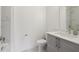 Modern bathroom features white cabinets, sink, and a toilet at 1251 Chelsea Nw Cir, Atlanta, GA 30318