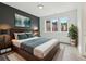 Serene bedroom featuring a king-size bed, calming color palette, and ample natural light at 1251 Chelsea Nw Cir, Atlanta, GA 30318