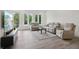 Bright living room featuring modern furniture, large windows, and stylish décor at 1251 Chelsea Nw Cir, Atlanta, GA 30318