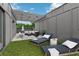Relaxing rooftop deck with lounge chairs and seating under a decorative pergola at 1251 Chelsea Nw Cir, Atlanta, GA 30318