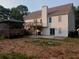 Backyard with house, deck, patio and covered structure at 2775 Emerald Springs Dr, Lawrenceville, GA 30045