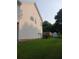 Side view of a home with a wooden deck and a shed in the backyard at 2775 Emerald Springs Dr, Lawrenceville, GA 30045