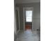 Bathroom featuring elegant marble floors, a shower, and a view into the bedroom at 2775 Emerald Springs Dr, Lawrenceville, GA 30045