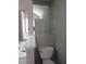 Modern bathroom featuring toilet, sink and mirror at 2775 Emerald Springs Dr, Lawrenceville, GA 30045