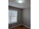 Bedroom with fresh paint, window, and hardwood floors at 2775 Emerald Springs Dr, Lawrenceville, GA 30045
