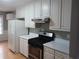 Bright kitchen with modern appliances, ample counter space, and natural light at 2775 Emerald Springs Dr, Lawrenceville, GA 30045
