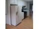 Clean kitchen featuring white appliances and plenty of cabinet space at 2775 Emerald Springs Dr, Lawrenceville, GA 30045