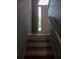 A staircase leads to a front door with a glass window and white trim at 2775 Emerald Springs Dr, Lawrenceville, GA 30045