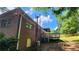 Brick house with a cozy deck, perfect for outdoor relaxation and entertaining guests at 766 Virginia Cir, Forest Park, GA 30297