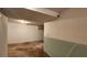 Unfinished basement with concrete flooring and unfinished walls ready for renovation at 766 Virginia Cir, Forest Park, GA 30297