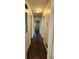 Hallway with wood flooring featuring recessed lighting and multiple entryways at 766 Virginia Cir, Forest Park, GA 30297
