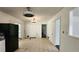 Open kitchen area with tile floor, black appliances and lots of room at 766 Virginia Cir, Forest Park, GA 30297